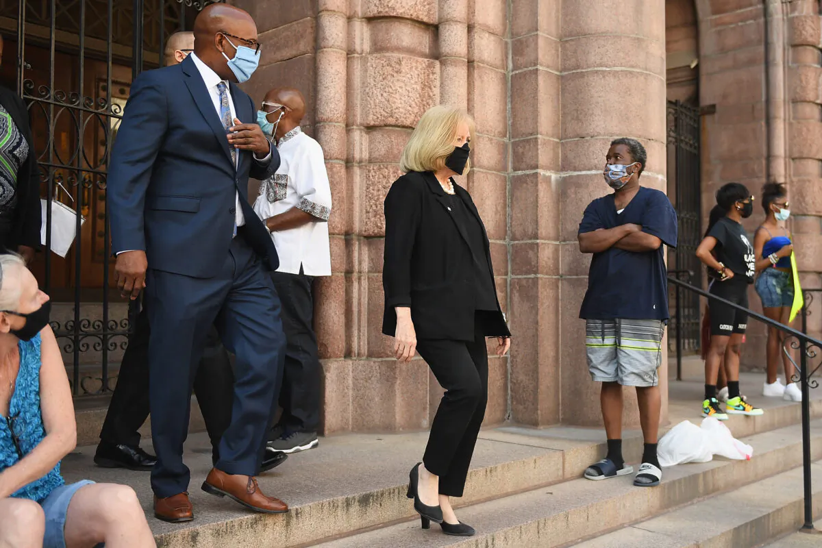 St. Louis City Mayor Lyda Krewson joins protesters as they demonstrate against police brutality and the death of George Floyd outside the St. Louis City Justice Center and City Hall  in St Louis, Mo., on June 1, 2020. (Michael B. Thomas/Getty Images)