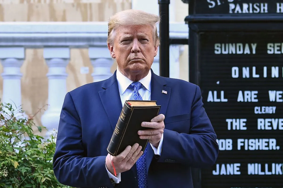 President Donald Trump holds up a Bible outside St. John's Church across Lafayette Park in Washington, on June 1, 2020. (Brendan Smialowski/AFP via Getty Images)