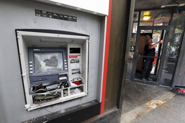 A damaged ATM machine outside a KeyBank branch in downtown Pittsburgh