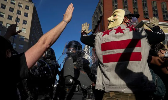 Demonstrators confront law enforcement during a protest in downtown Washington on June 1, 2020. (Drew Angerer/Getty Images)