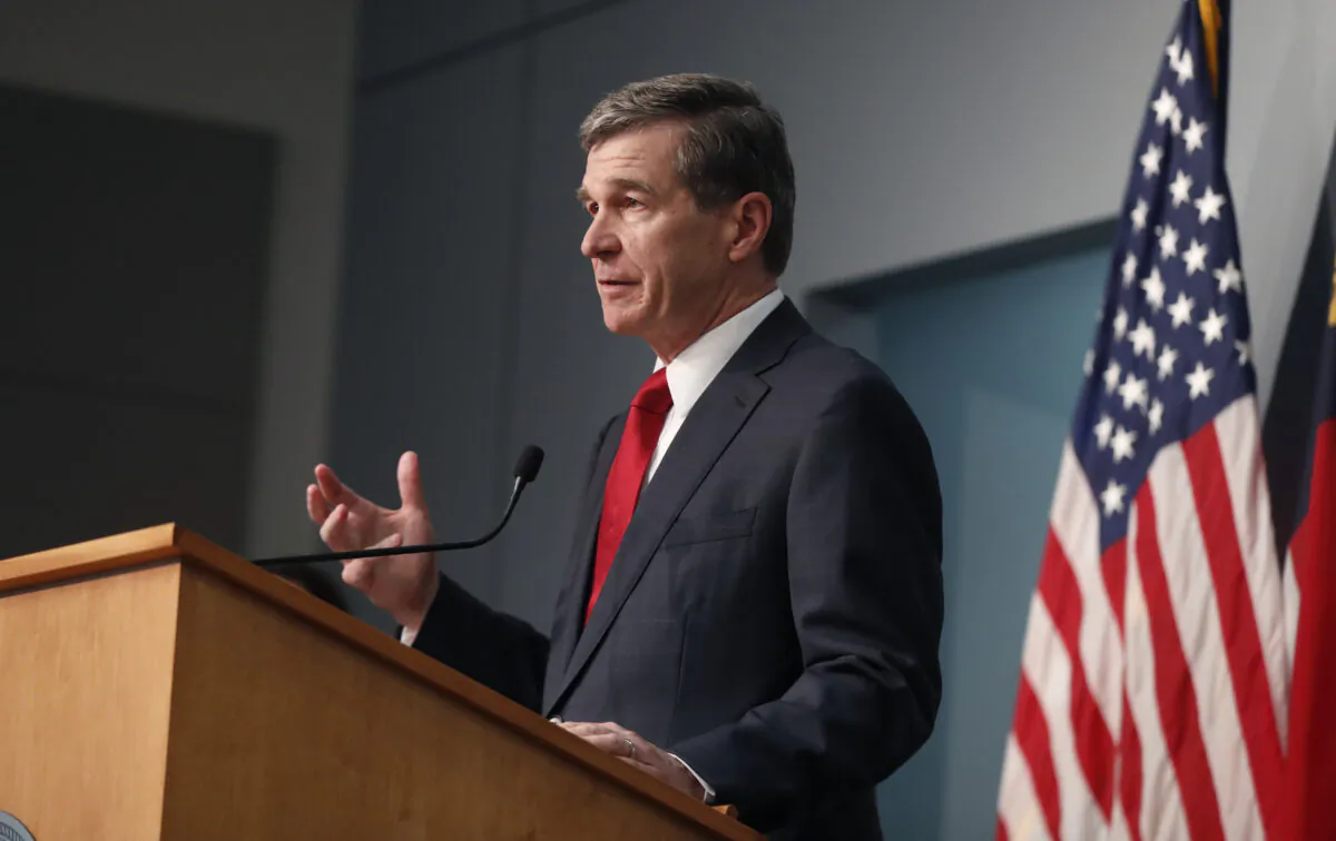 North Carolina Gov. Roy Cooper speaks during a briefing at the Emergency Operations Center in Raleigh, N.C., on June 2, 2020. (Ethan Hyman/The News & Observer via AP)