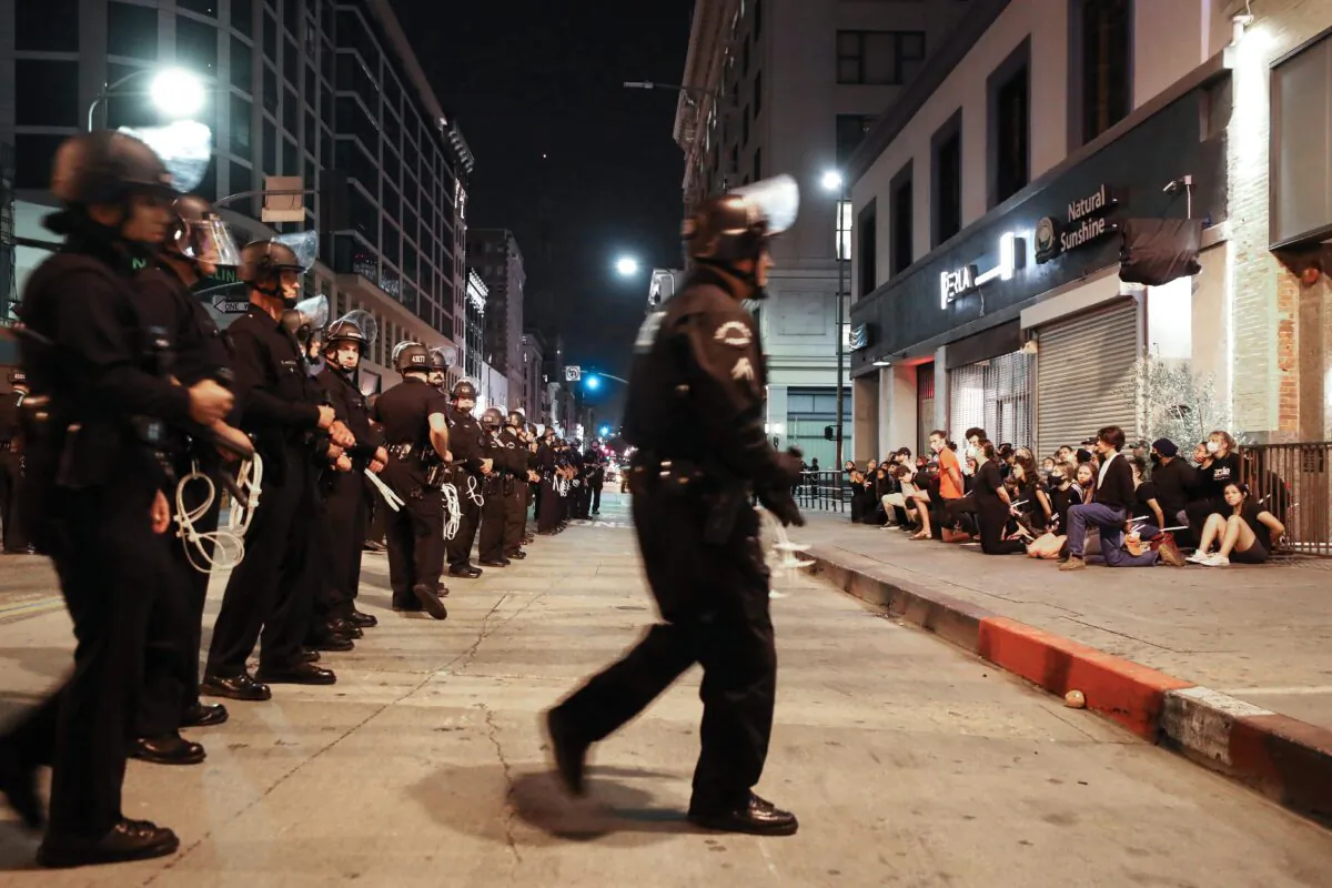 Protesters are arrested after curfew went into effect during mostly peaceful demonstrations over George Floyd’s death downtown in Los Angeles, Calif. on June 2, 2020. (Mario Tama/Getty Images)