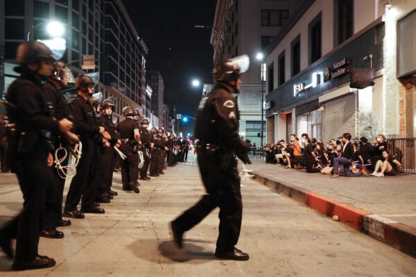 Protesters are arrested after curfew