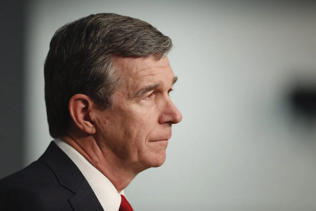North Carolina Gov. Roy Cooper speaks during a briefing at the Emergency Operations Center in Raleigh, N.C., on June 2, 2020. (Ethan Hyman/The News & Observer via AP)