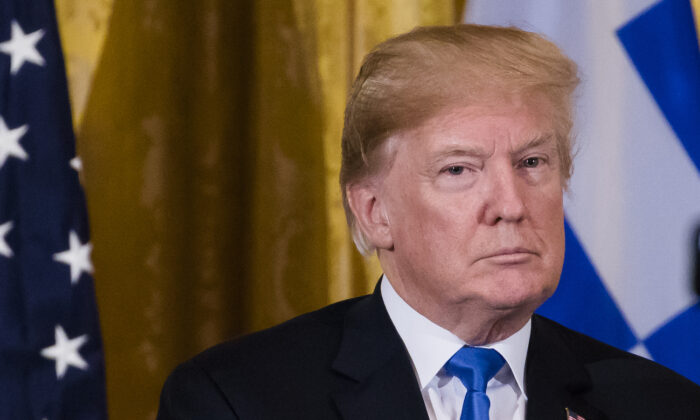 President Donald Trump hosts the Greek Independence Day Celebration in the East Room of the White House in Washington on March 22, 2018. (Samira Bouaou/The Epoch Times)