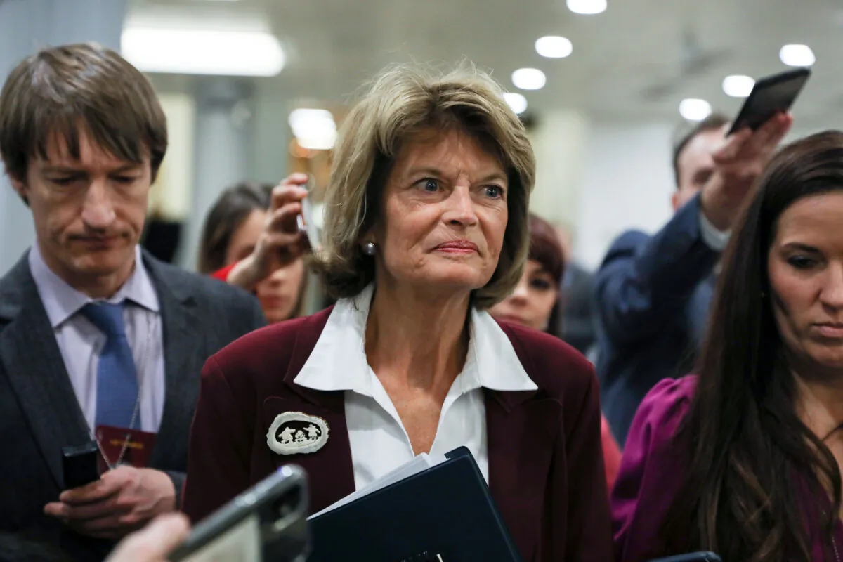 Sen. Lisa Murkowski (R-Alaska) walks through the Senate subway area during a break in impeachment proceedings, in the Capitol in Washington on Jan. 28, 2020. (Charlotte Cuthbertson/The Epoch Times)