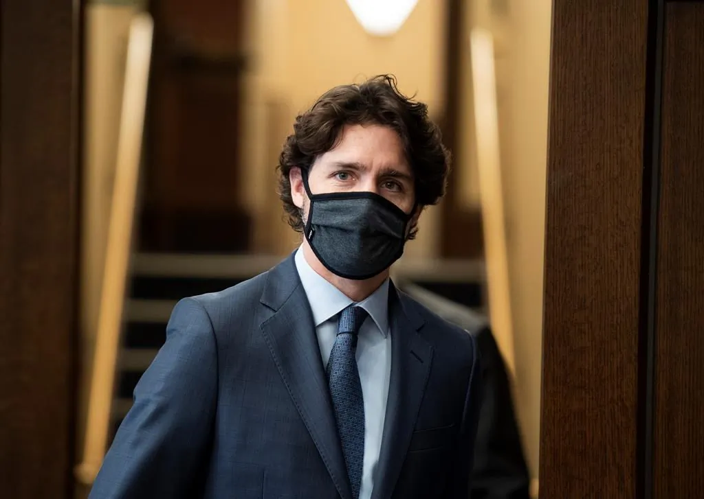 Prime Minister Justin Trudeau heads into the House of Commons at West Block on Parliament Hill in Ottawa, on June 2, 2020. (The Canadian Press/Justin Tang)