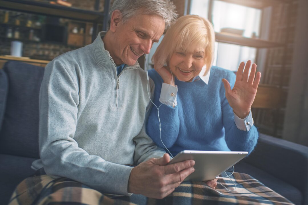 Many grandparents are doing their best to stay connected with grandchildren through video conferencing and phone calls, but these technologies are shallow replacements for real contact. (Estrada Anton/Shutterstock)