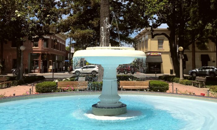 The century-old fountain in Old Towne Orange’s center circle, which has been a place of gathering for generations, is pictured on May 30, 2020. (Chris Karr/The Epoch Times)