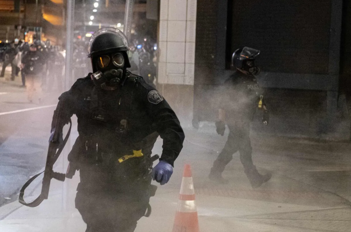 A police officer responds during a protest in the city of Detroit, Mich., on May 29, 2020. (Seth Herald/AFP/Getty Images)