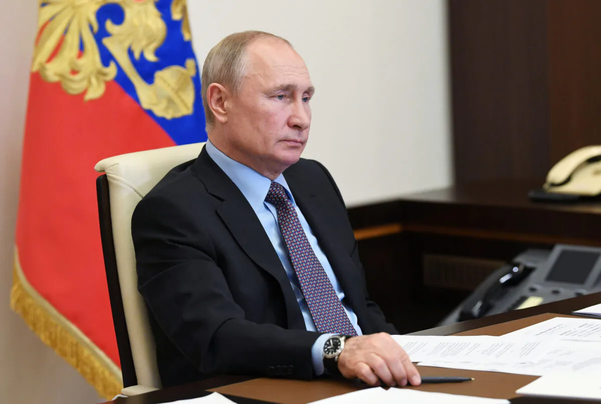 Russia's President Vladimir Putin takes part in a video conference call with representatives of environmental and animal protection public organizations, at the Novo-Ogaryovo state residence outside Moscow, Russia, on June 5, 2020. (Alexei Nikolsky/Sputnik/Kremlin via Reuters)