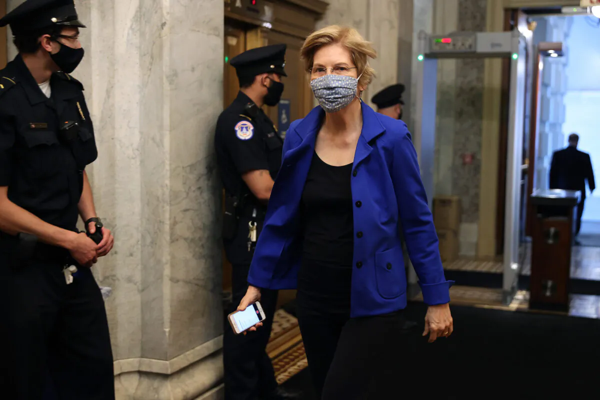 Sen. Elizabeth Warren (D-Mass.) arrives at the U.S. Capitol, in Washington for a vote May 18, 2020. (Chip Somodevilla/Getty Images)