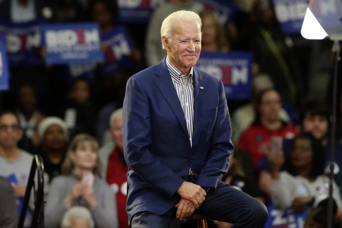 Democratic presidential candidate former Vice President Joe Biden smiles at supporters during a campaign event at Saint Augustine's University in Raleigh, N.C., on Feb. 29, 2020. (AP Photo/Gerry Broome, File)