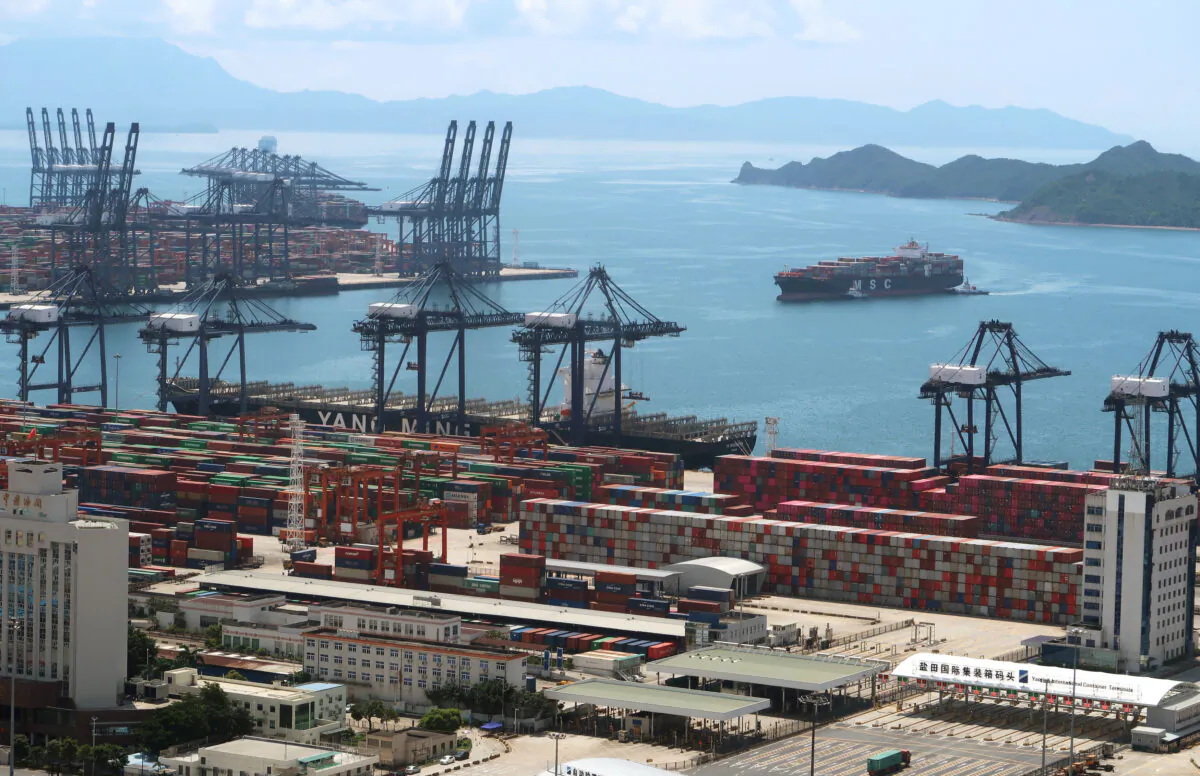 A cargo ship carrying containers is seen near the Yantian port in Shenzhen, following the COVID-19 outbreak, in Guangdong Province, China, on May 17, 2020. (Martin Pollard/Reuters)