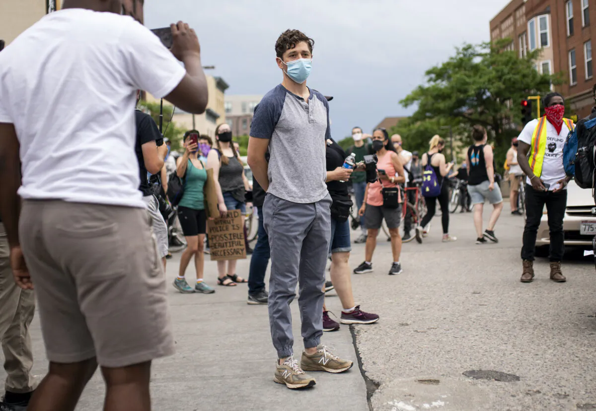 Minneapolis Democrat Mayor Jacob Frey looks over a demonstration calling for the Minneapolis Police Department to be defunded in Minneapolis, Minn., on June 6, 2020. (Stephen Maturen/Getty Images)