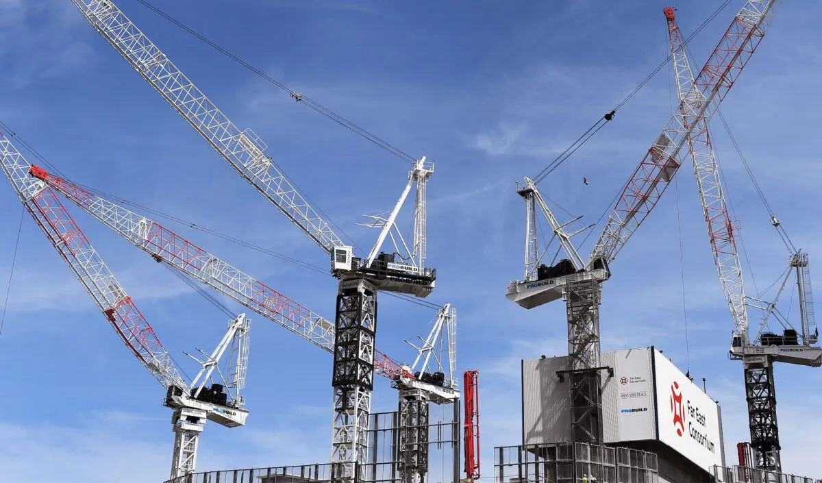 Cranes work on a building site in Melbourne's central business district on October 2, 2018. (Willian West/AFP via Getty Images)