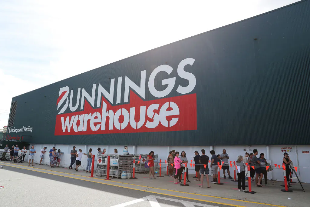 Shoppers are forced to queue outside Bunnings in Myaree due to new government social distancing measures on March 28, 2020 in Perth, Australia. (Paul Kane/Getty Images)