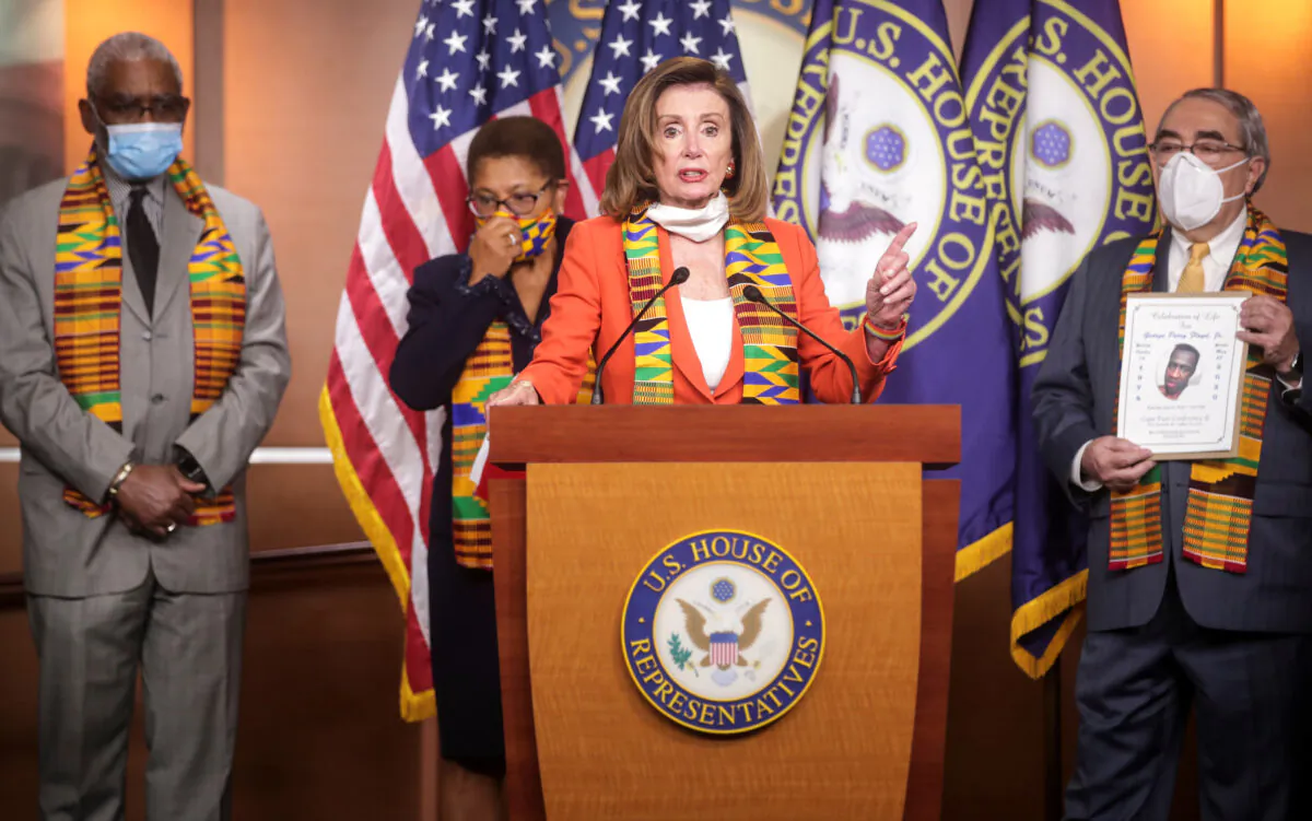 House Speaker Nancy Pelosi (D-Calif.) stands with members of the Congressional Black Caucus during a news conference to unveil legislation to combat police violence and racial injustice at the U.S. Capitol in Washington on June 8, 2020. (Jonathan Ernst/Reuters)