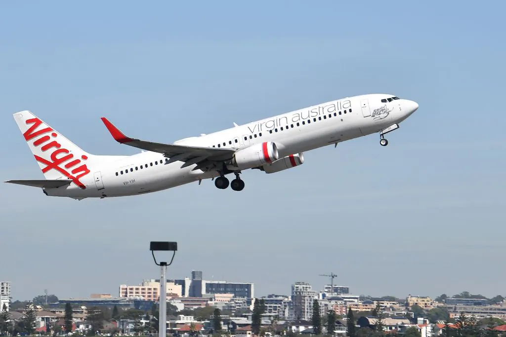 A Virgin Australia plane takes off at Sydney Airport in Sydney, Australia on March 19, 2020. (Saeed Khan via Getty Images)