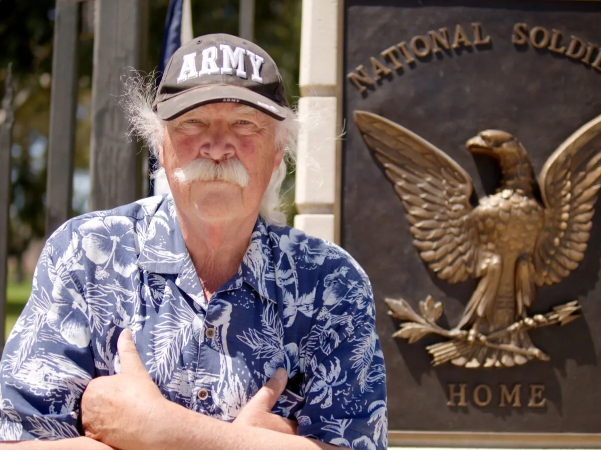 Vietnam War veteran Robert Rosebrock stands in front of the Veteran Affairs (VA) Greater Los Angeles Healthcare System campus to protest uses of the campus he says do not serve veterans, on June 7, 2020. (Hau Nguyen/The Epoch Times)