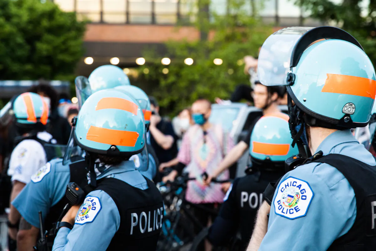 Chicago Police Department officers gather as curfew nears during a demonstration in Chicago, Ill., on June 6, 2020. (Natasha Moustache/Getty Images)