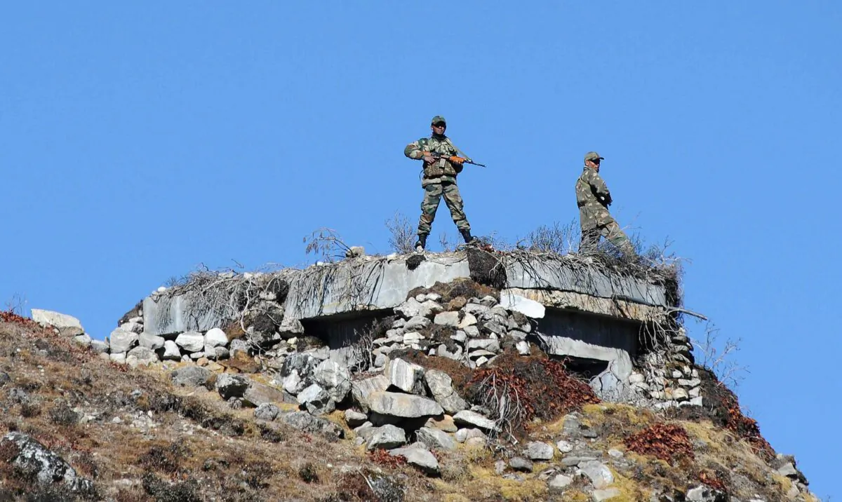 Indian Army personnel keep vigilance at Bumla pass at the India-China border in Arunachal Pradesh on Oct. 21, 2012. (Biju Boro/AFP via Getty Images)