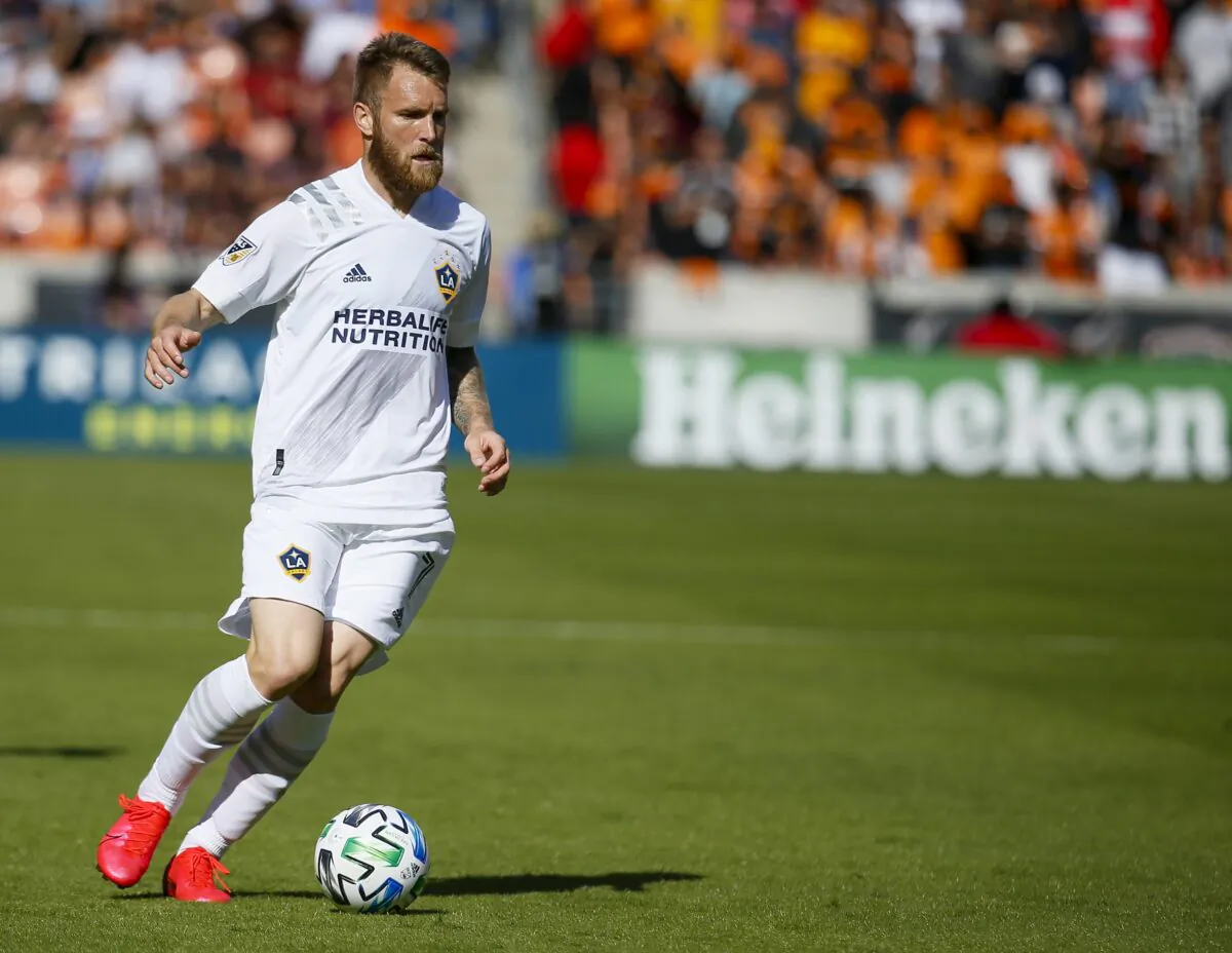 Aleksandar Katai #7 of Los Angeles Galaxy brings the ball up field against the Houston Dynamo at BBVA Stadium in Houston, Texas, on Feb. 29, 2020. (Bob Levey/Getty Images)