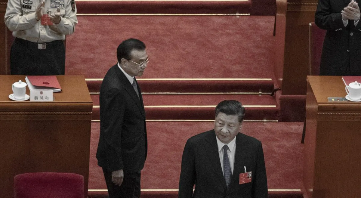 Chinese leader Xi Jinping and premier Li Keqiang arrived at the closing session of the party’s rubber stamp legislature’s congress in Beijing on May 28, 2020. (Kevin Frayer/Getty Images)