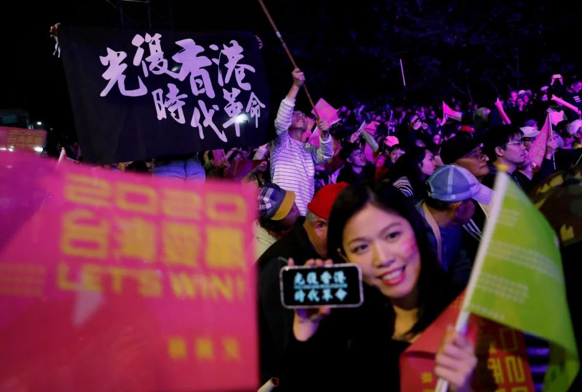Hong Kong anti-government protesters attend a rally in support of Taiwan President Tsai Ing-wen outside the Democratic Progressive Party (DPP) headquarters in Taipei, Taiwan, on Jan. 11, 2020. (Tyrone Siu/Reuters)