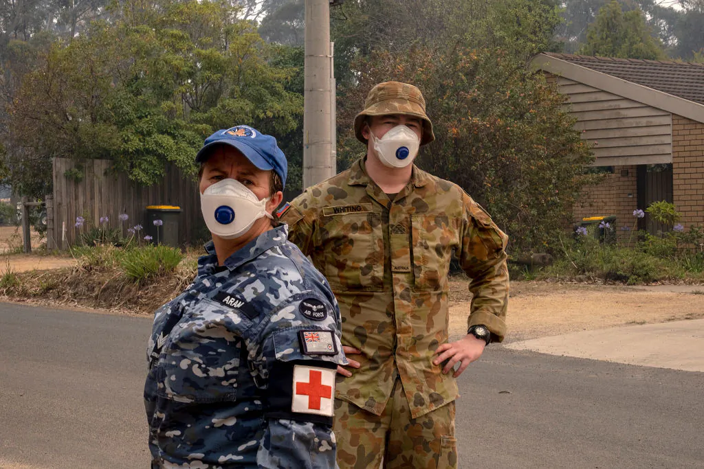 Australian Defence Force (ADF) personal wear a mask while working in Mallacoota on January 15, 2020, Australia. (Luis Ascui/Getty Images)
