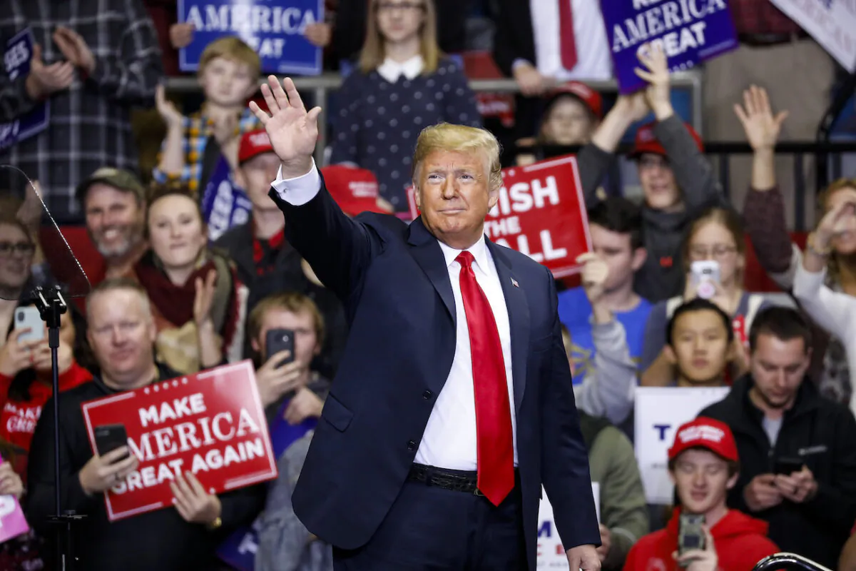 President Donald Trump arrives at a campaign rally for Republican Senate candidate Mike Braun at the County War Memorial Coliseum in Fort Wayne, Indiana on Nov. 5, 2018. (Aaron P. Bernstein/Getty Images)