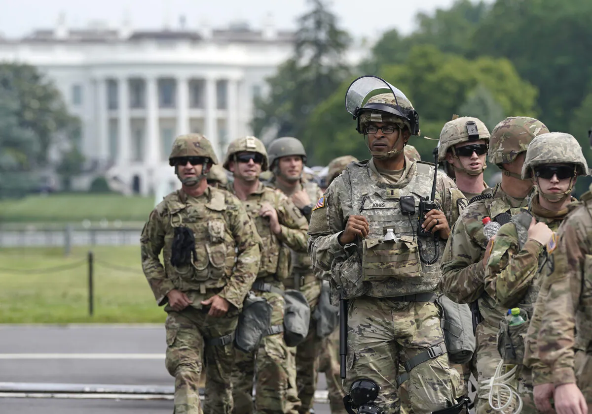 National Guard members deploy near the White House as peaceful protests are scheduled against police brutality and the death of George Floyd, in Washington, on June 6, 2020. (Drew Angerer/Getty Images)