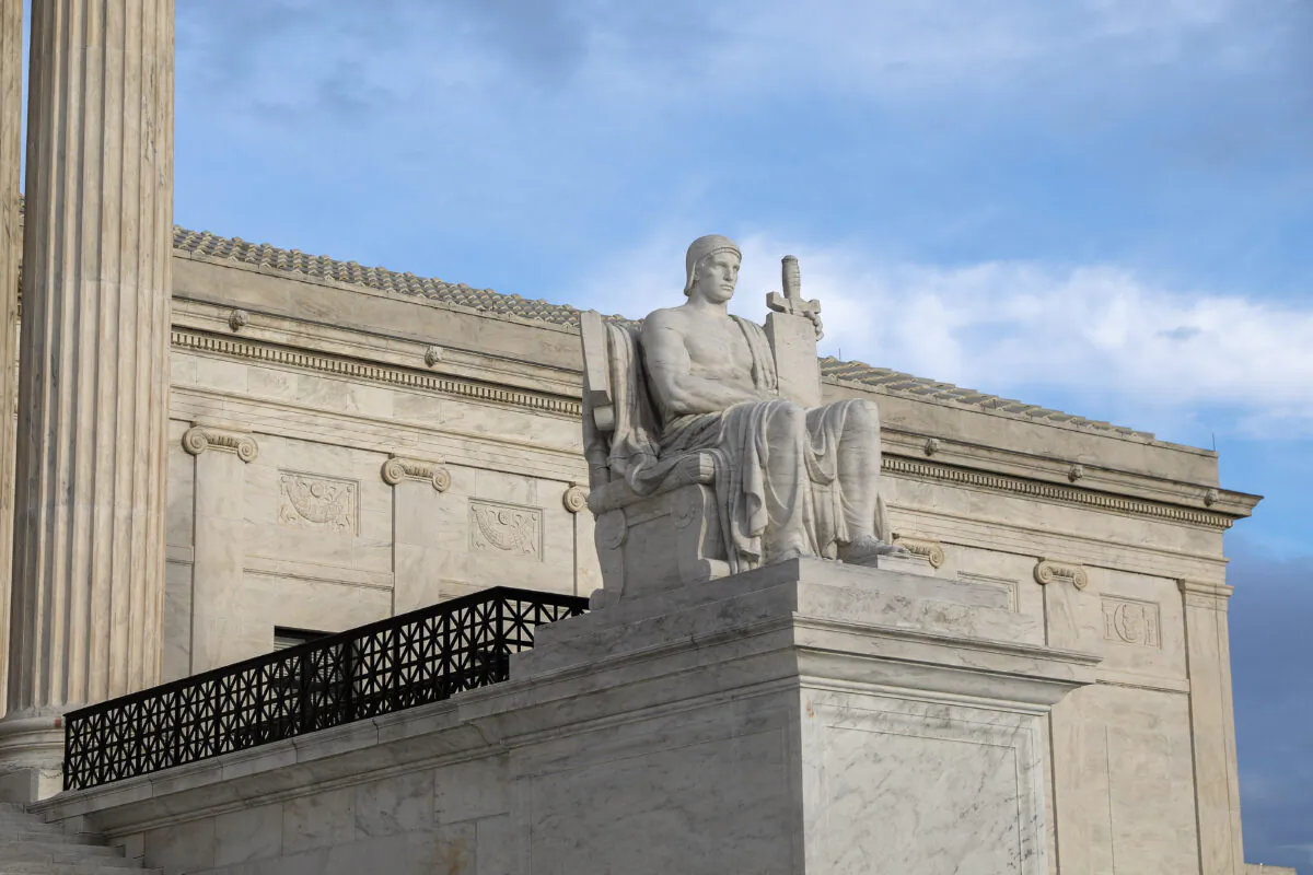 The Authority of Law statue of the Supreme Court in Washington on March 10, 2020. (Samira Bouaou/The Epoch Times)