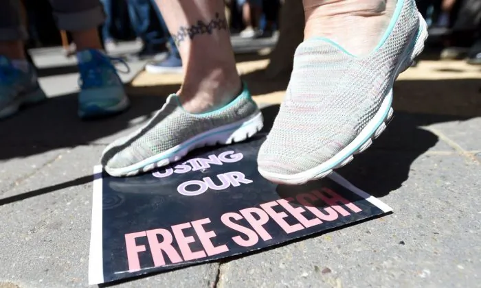 A woman stomps on a free speech sign at the University of California–Berkeley in Berkeley, Calif., on Sept. 24, 2017. (Josh Edelson/AFP/Getty Images)