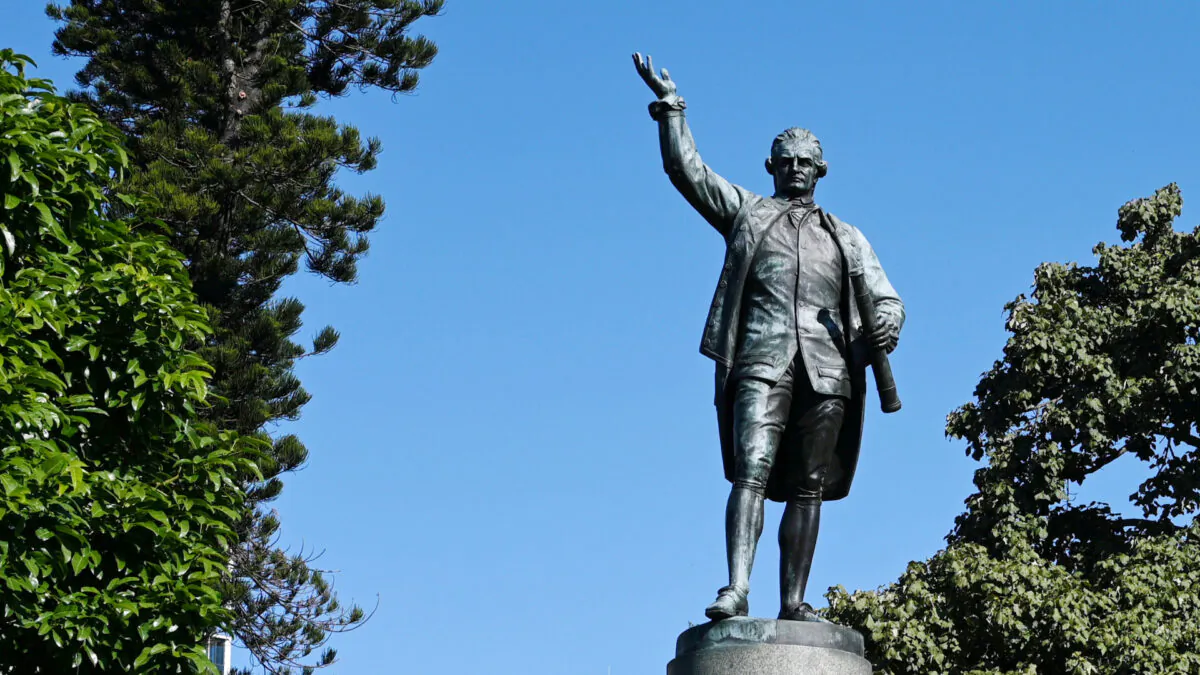 Two women have been charged for allegedly spraying graffiti on a statue of Captain James Cook in Sydney's Hyde Park on June 14. (William West/Getty Images)