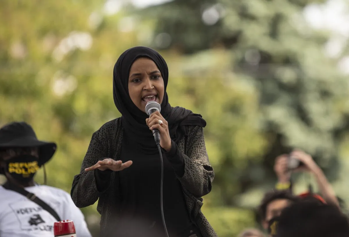 Rep. Ilhan Omar (D-Minn.) speaks to a crowd gathered for a march to defund the Minneapolis Police Department in Minneapolis on June 6, 2020. (Stephen Maturen/Getty Images)