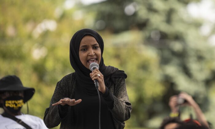 Rep. Ilhan Omar (D-Minn.) speaks to a crowd gathered for a march to defund the Minneapolis Police Department in Minneapolis, Minn., on June 6, 2020. (Stephen Maturen/Getty Images)