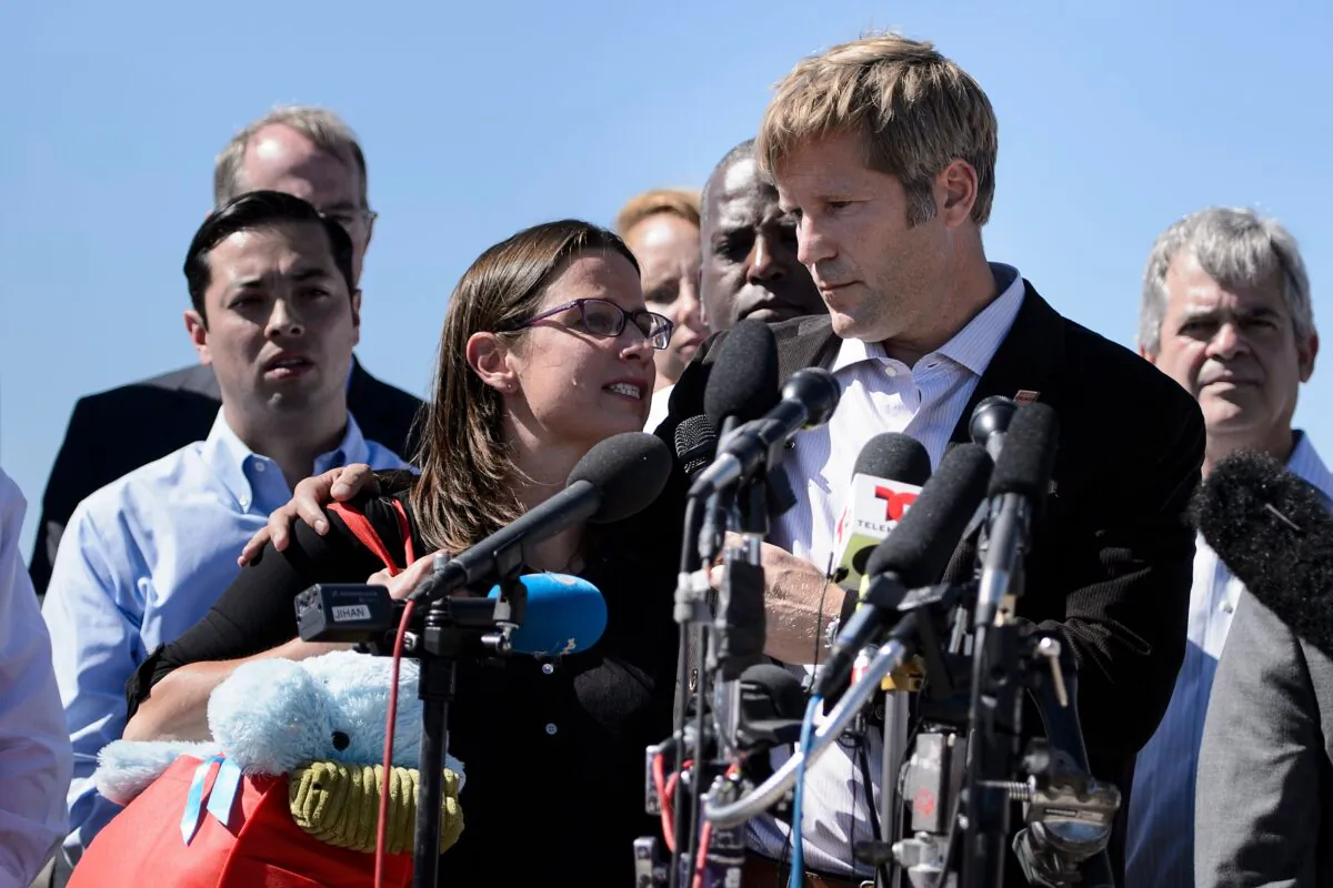 Tim Keller, The mayor of Albuquerque, Tim Keller (Front Right), takes part in a press event in Tornillo, Texas, on June 21, 2018. (Brendan Smialowski/AFP/Getty Images)