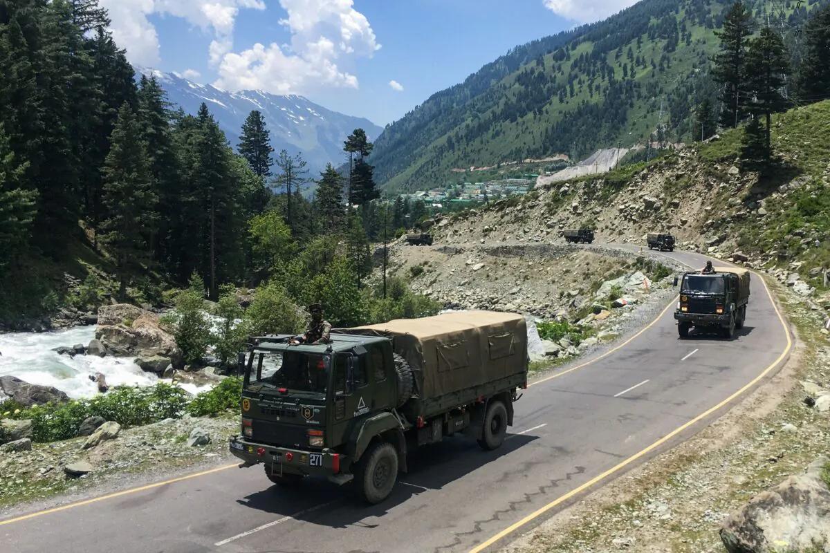 Indian army convoys make their way towards Leh, bordering China, in Gagangir, India on June 17, 2020. (TAUSEEF MUSTAFA/AFP via Getty Images)