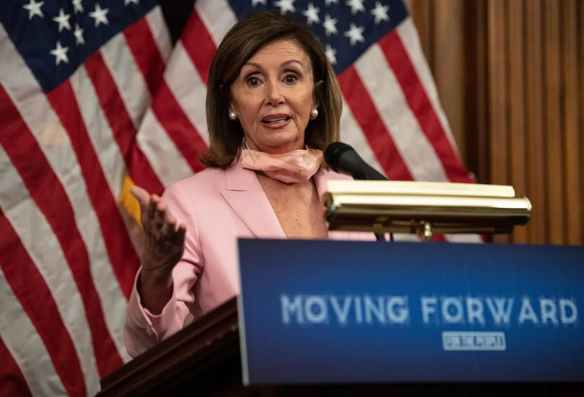 House Speaker Nancy Pelosi (D-Calif.) speaks during the unveiling of the Moving Forward Act, legislation to rebuild the country's infrastructure, at the U.S. Capitol in Washington on June 18, 2020. (Nicholas Kamm/AFP via Getty Images)