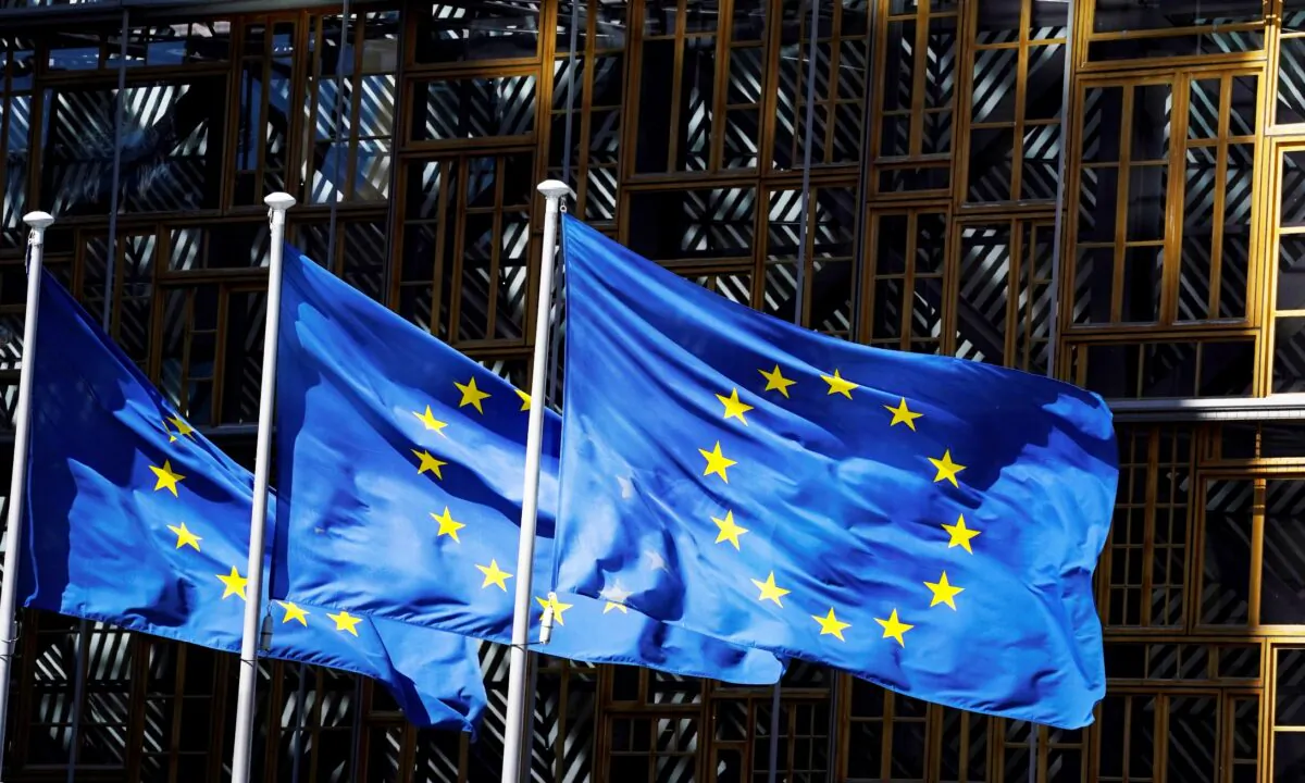 The European Union flags fluttering in the air outside the European Commission building in Brussels, Belgium, on May 28, 2020. (Kenzo Tribouillard /AFP via Getty Images)