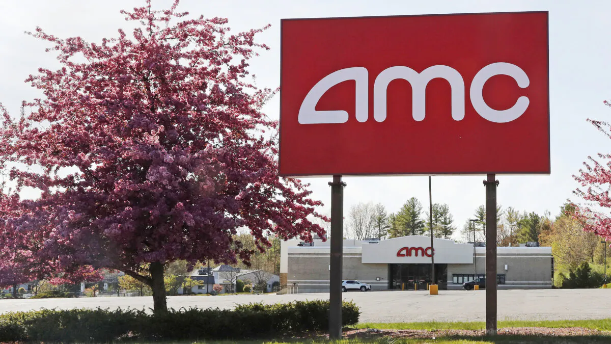 An AMC theater sign at a nearly empty parking lot for the theater in Londonderry, N.H., on May 14, 2020. (Charles Krupa/AP Photo)