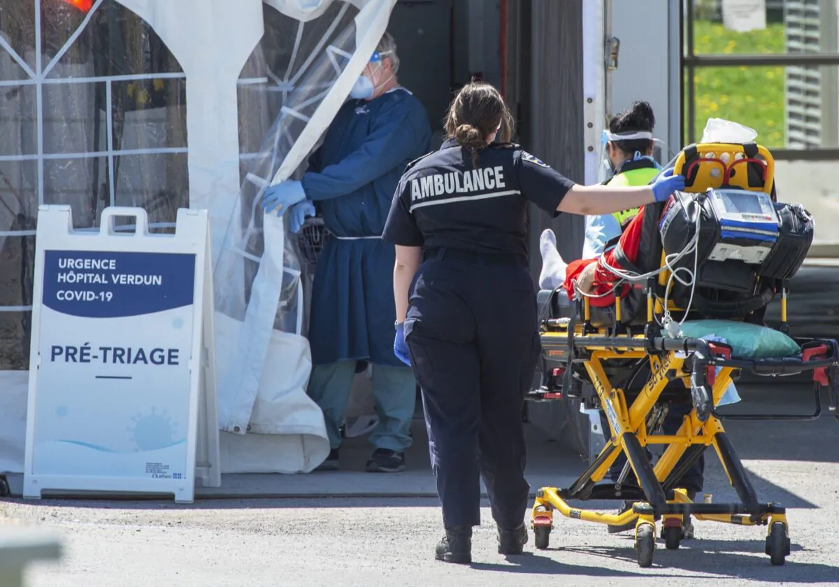 A patient is brought to the emergency department at the Verdun Hospital in Montreal on May 14, 2020. (The Canadian Press/Ryan Remiorz)