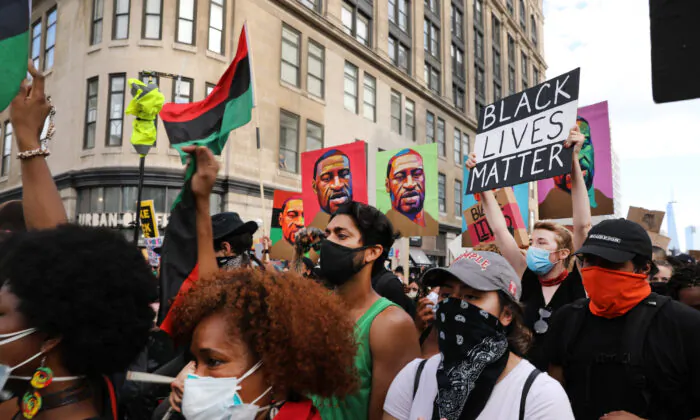 Thousands of people participate in a march in Manhattan, N.Y., on June 19, 2020. (Spencer Platt/Getty Images)