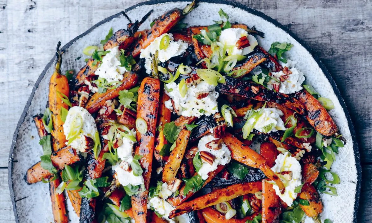 Grilling carrots brings out their natural sweetness, with transformative results. "If you’ve never grilled a carrot before, do it now," writes Genevieve Taylor. "They are an absolute revelation and show just how good fire-cooked vegetables can be." (Jason Ingram)