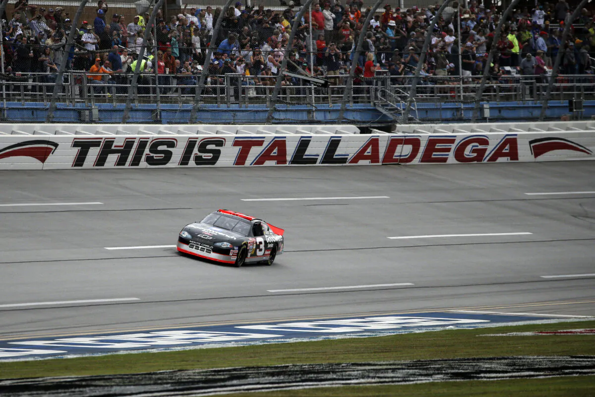 No. 3 car of the late NASCAR driver Dale Earnhardt Sr., driven by Richard Childress, takes a lap before a NASCAR Cup Series auto race at Talladega Superspeedway in Talladega, Ala, Oct. 13, 2019. (Butch Dill/AP photo)