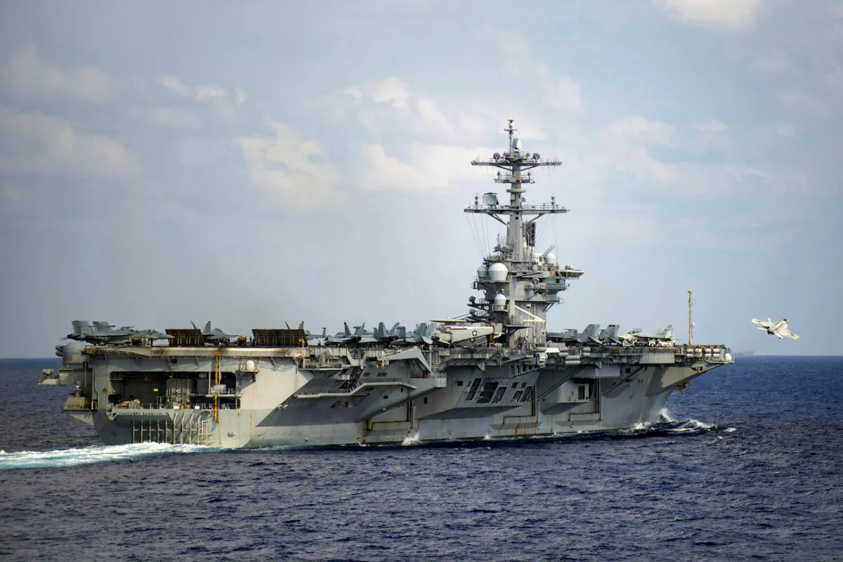 Aircraft carrier USS Theodore Roosevelt in the western North Pacific Ocean on March 18, 2020. (Mass Communication Specialist 3rd Class Nicholas V. Huynh/U.S. Navy via AP)