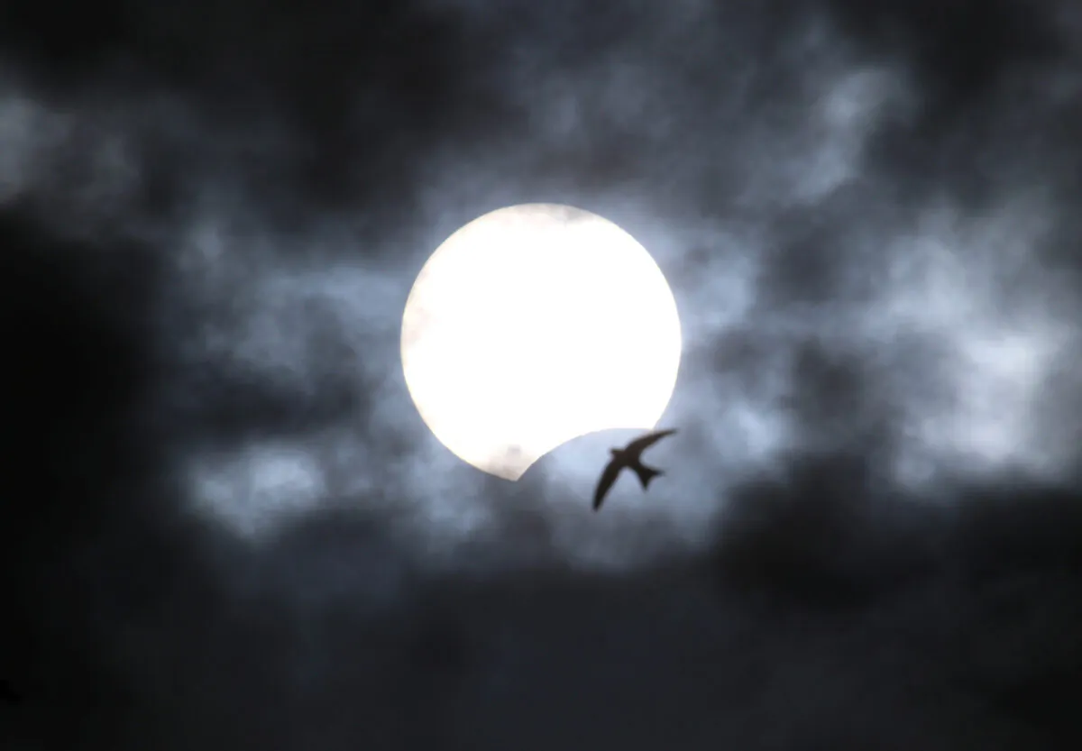 A partial solar eclipse is seen from Yevpatoria, Crimea, on June 21, 2020. (Alexey Pavlishak/Reuters)