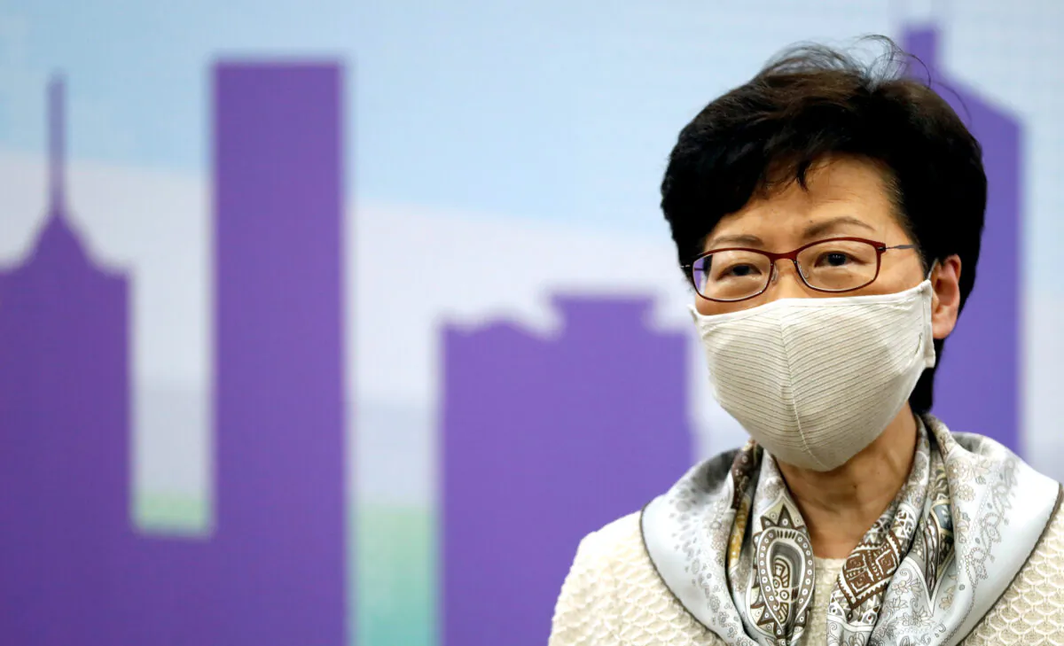 Hong Kong Chief Executive Carrie Lam, wearing a face mask following the CCP virus outbreak, holds a news conference in Beijing, China, on June 3, 2020. (Carlos Garcia Rawlins/Reuters)