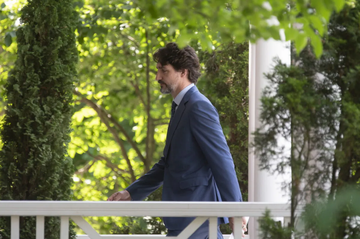 Prime Minister Justin Trudeau returns to Rideau Cottage following a news conference in Ottawa on June 22, 2020. (THE CANADIAN PRESS/Adrian Wyld)